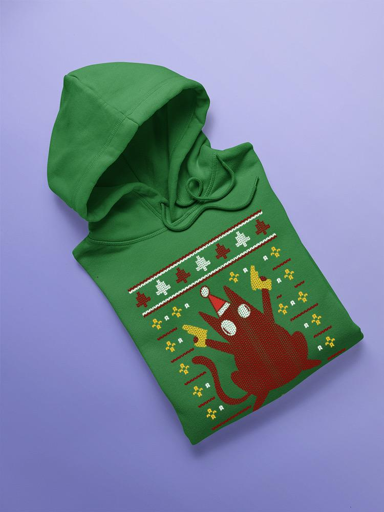 a green sweatshirt with a red and yellow design on it