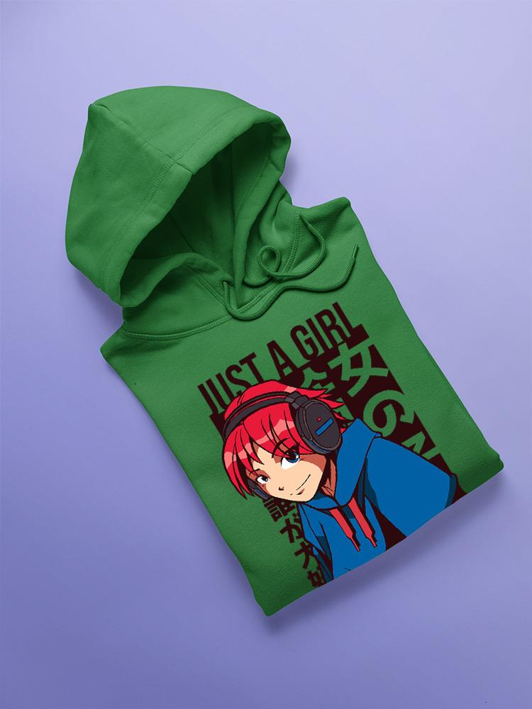 a green sweatshirt with a cartoon character on it