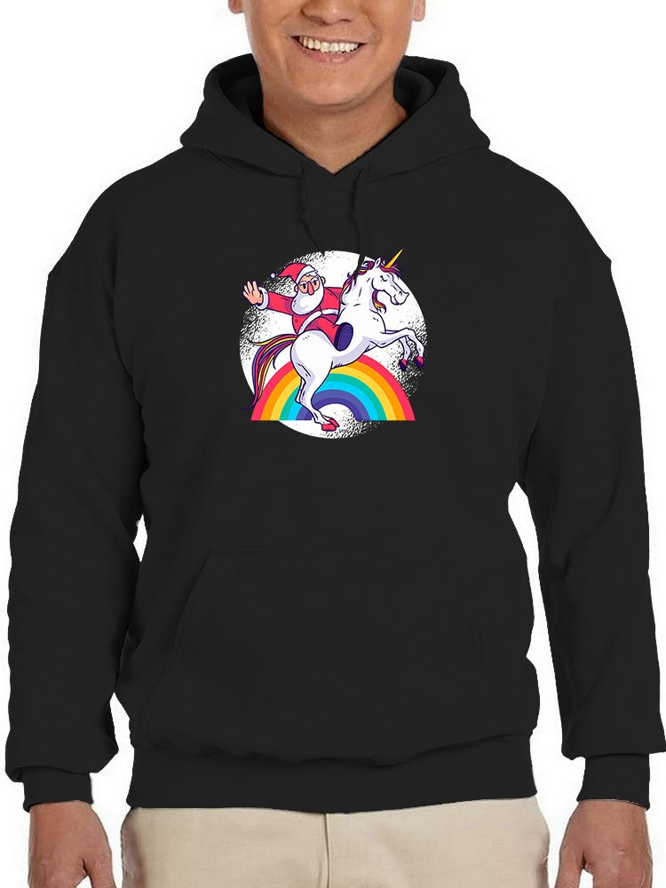a person wearing a black hoodie with a unicorn and santa claus