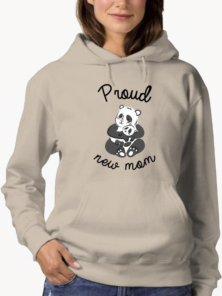 a woman wearing a hoodie