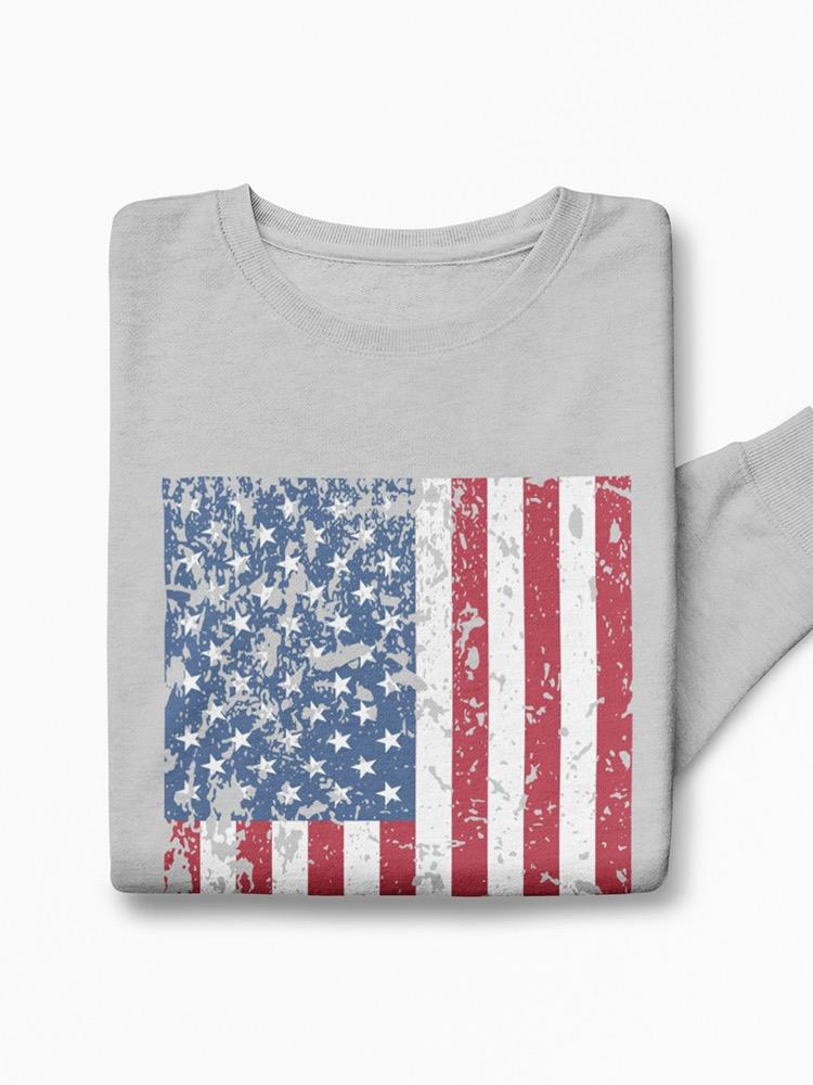a grey shirt with a flag on it