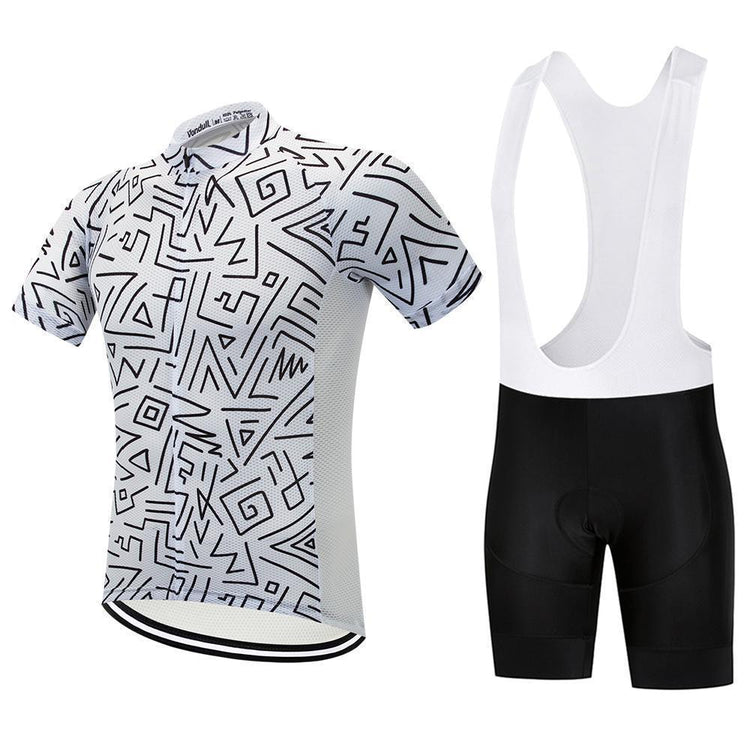 a black and white shirt and bib shorts