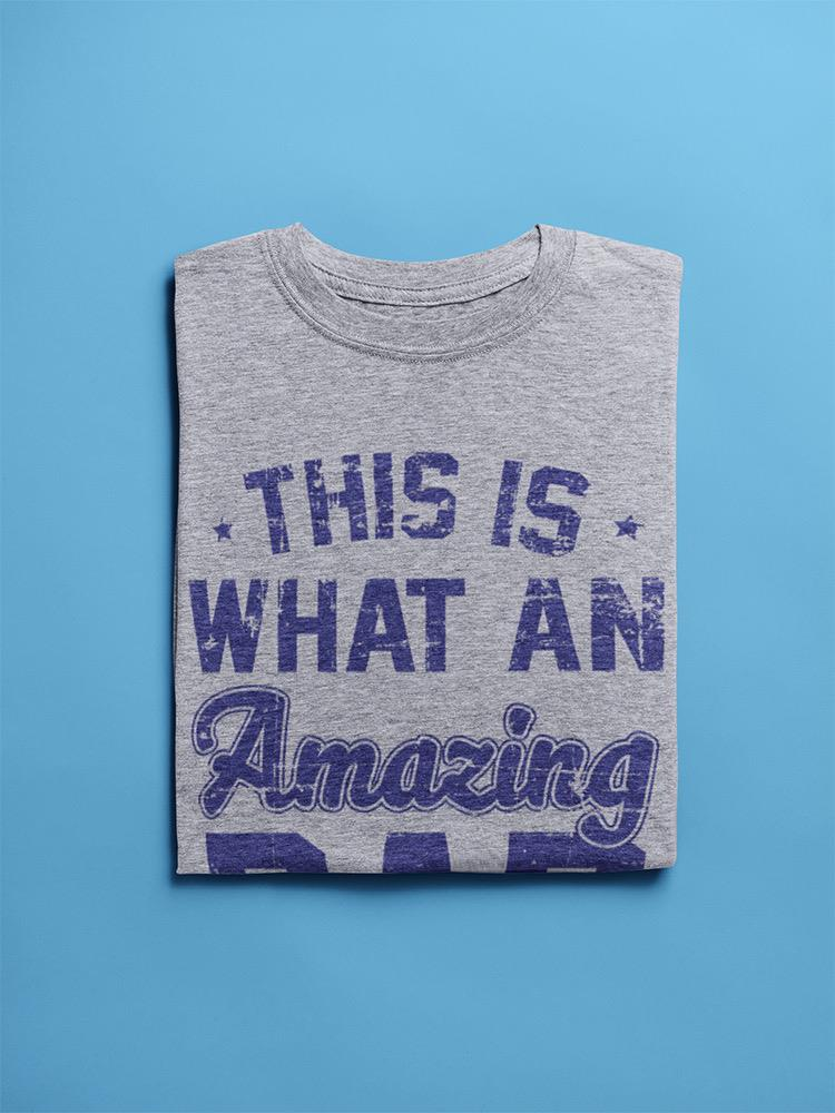 a folded grey shirt with blue text
