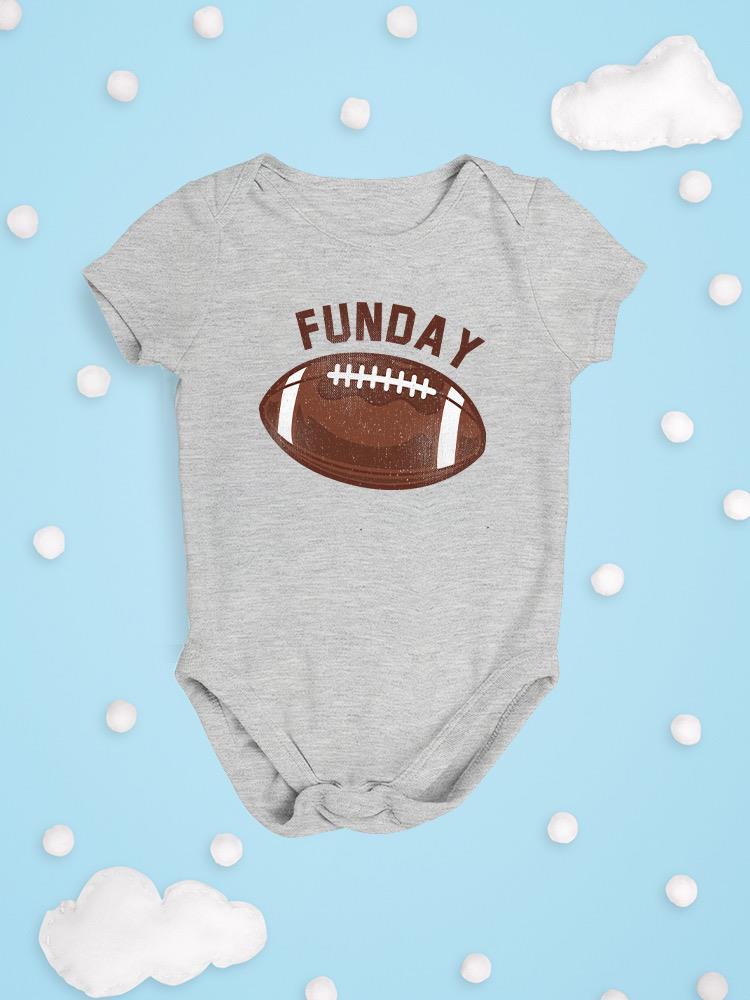 a grey baby bodysuit with a football design on it
