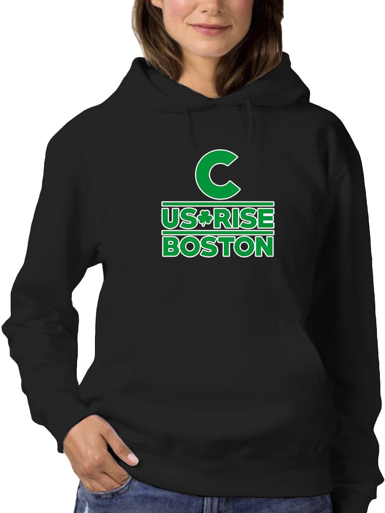 a woman wearing a black sweatshirt