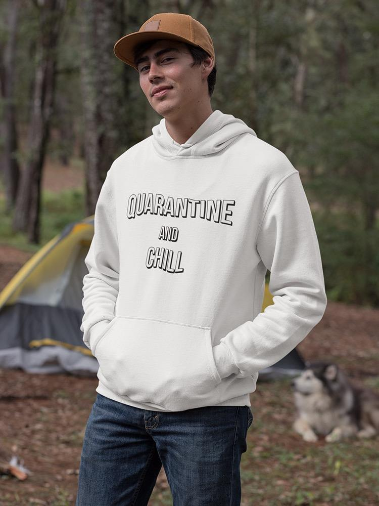 a man in a white sweatshirt with a dog in the background