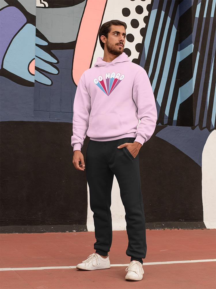 a man standing in front of a wall