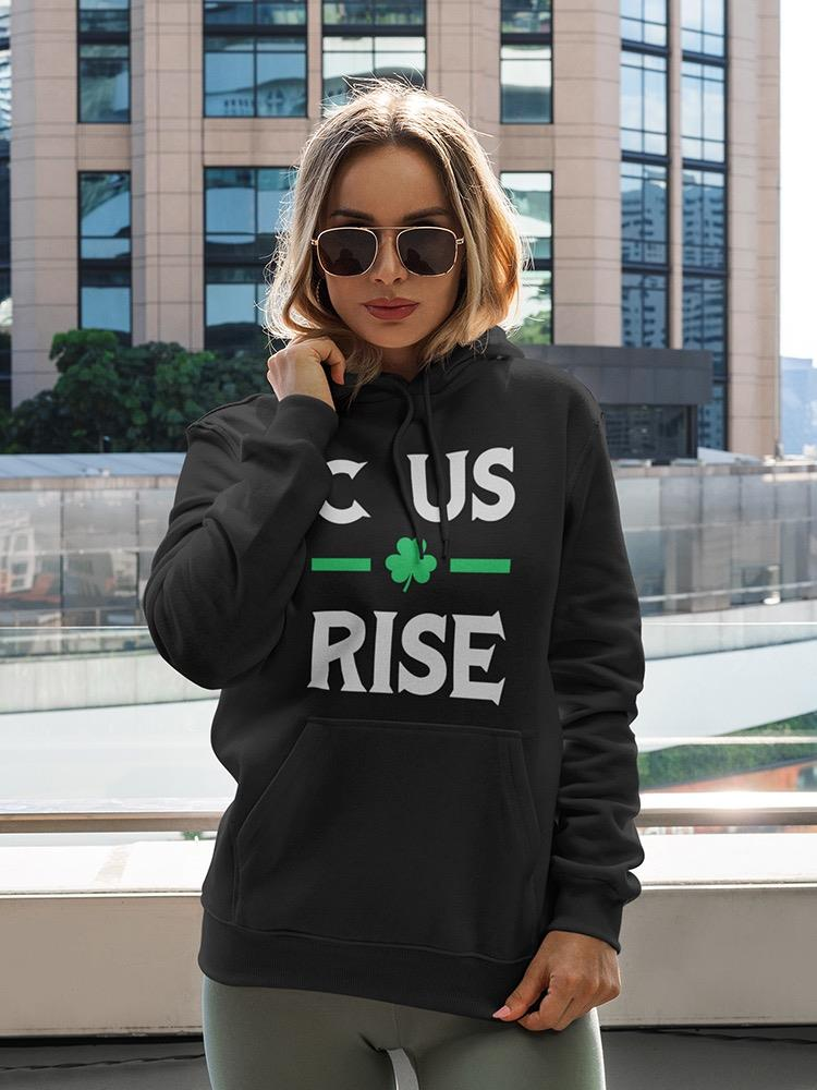 a woman wearing sunglasses and a black hoodie