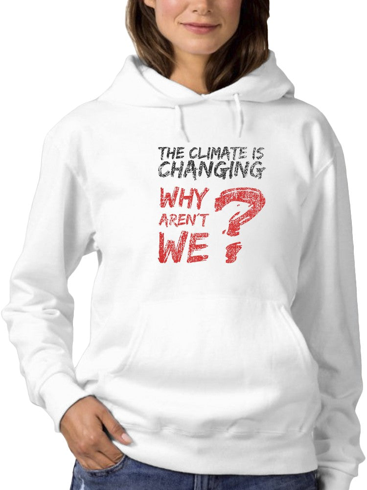 a woman wearing a white sweatshirt