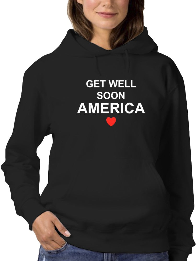 a woman wearing a black sweatshirt