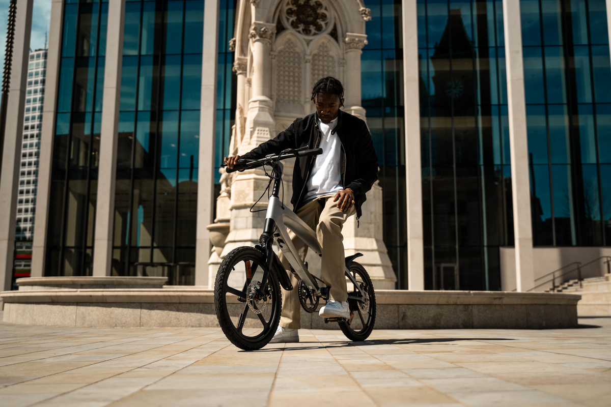 a man sitting on a bicycle
