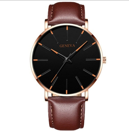 a watch with a brown band