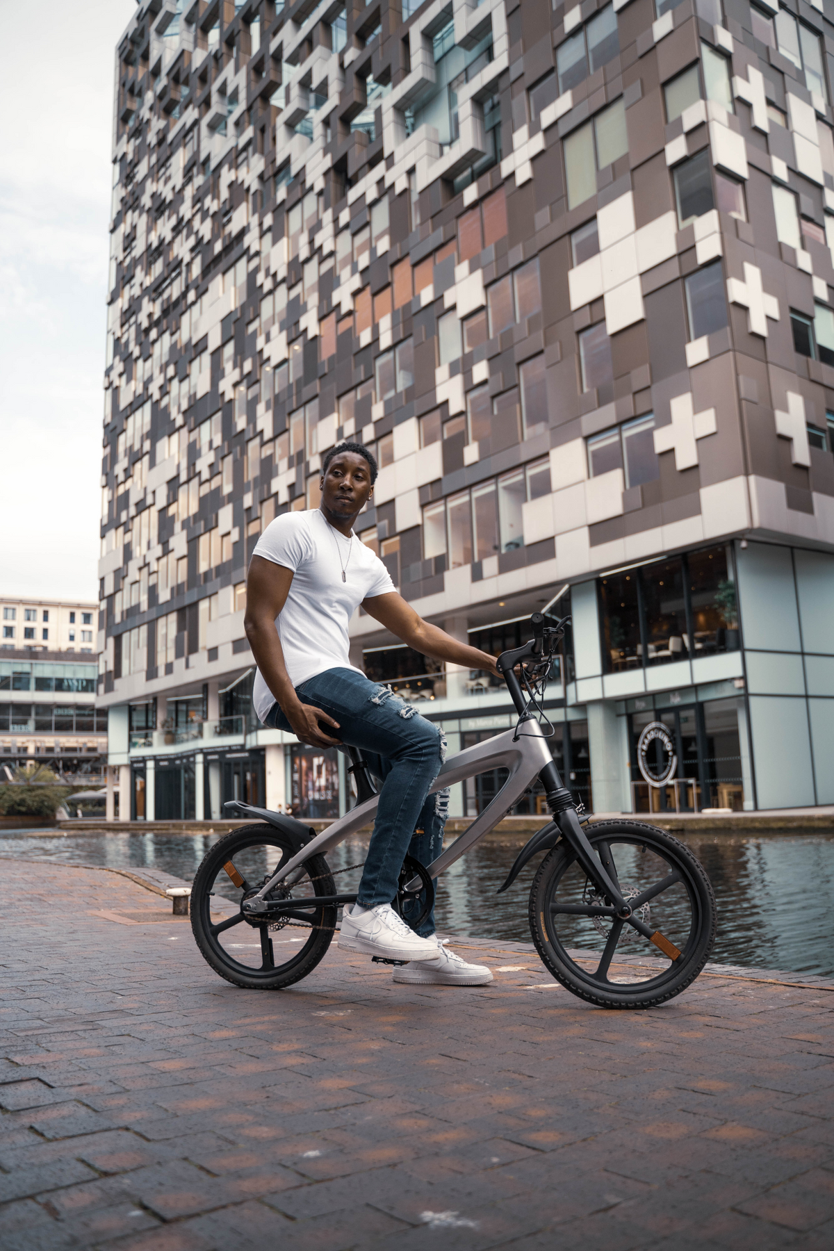 a man sitting on a bicycle