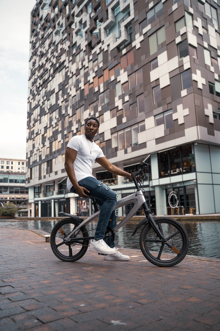 a man sitting on a bicycle