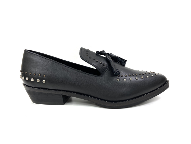 a black shoe with a tassel