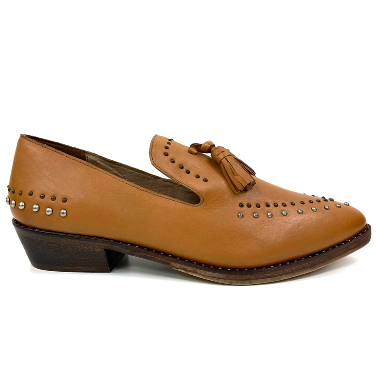 a brown shoe with tassels