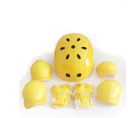 a yellow helmet and protective gear