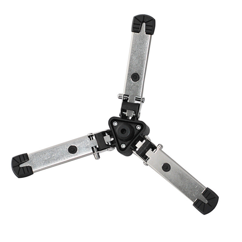 a metal object with black handles
