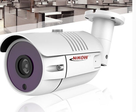 a white camera with a round lens