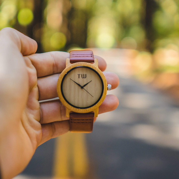 a person holding a watch