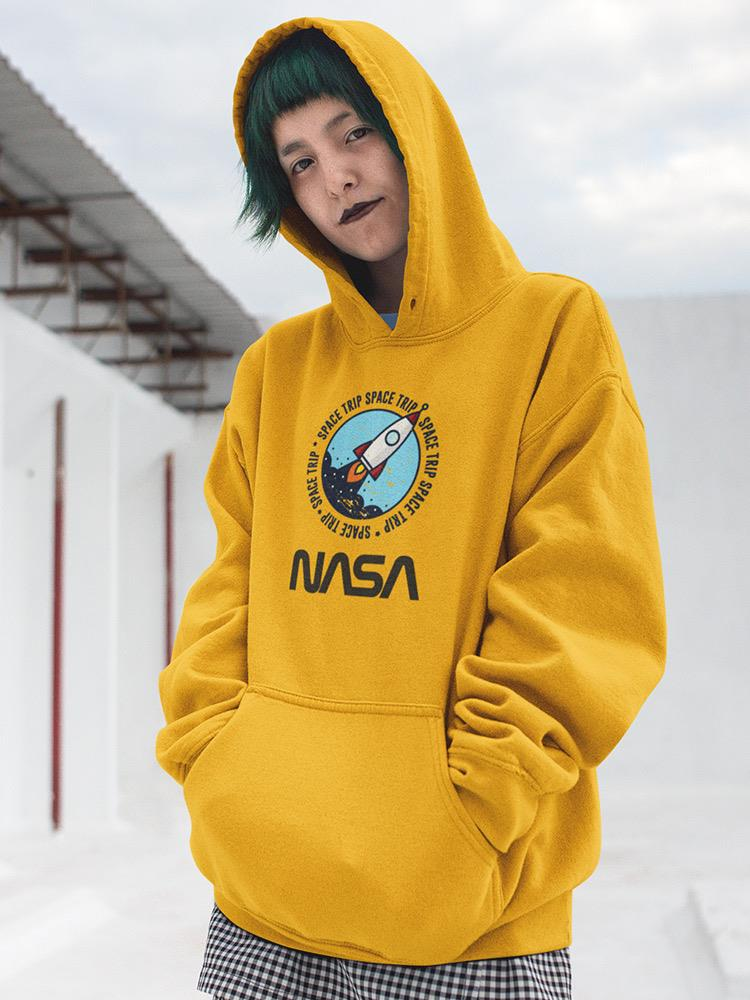 a person in a yellow hoodie