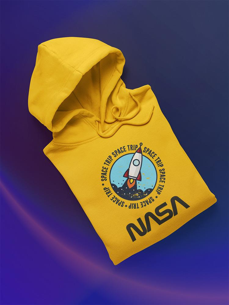a yellow hoodie with a rocket on it