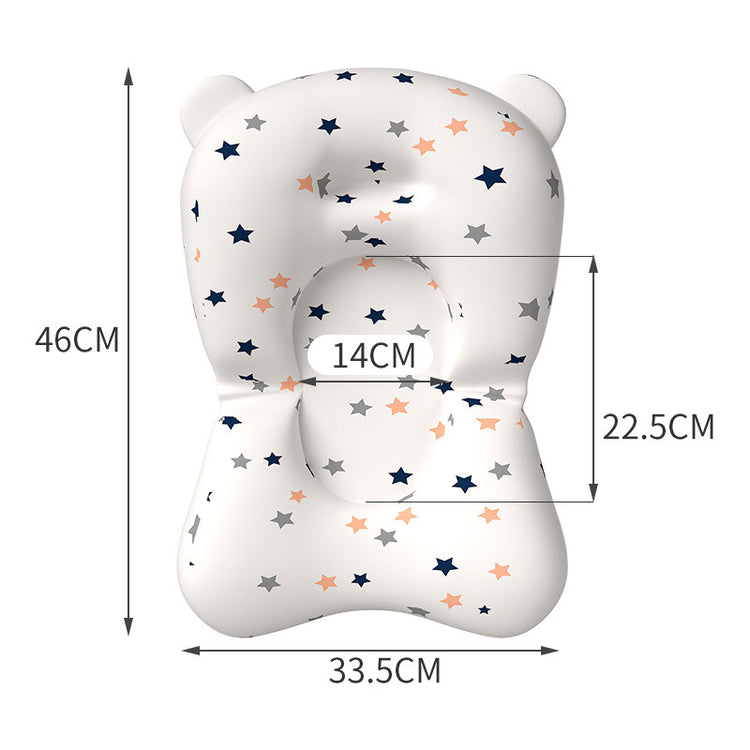 a white and blue baby pillow with stars