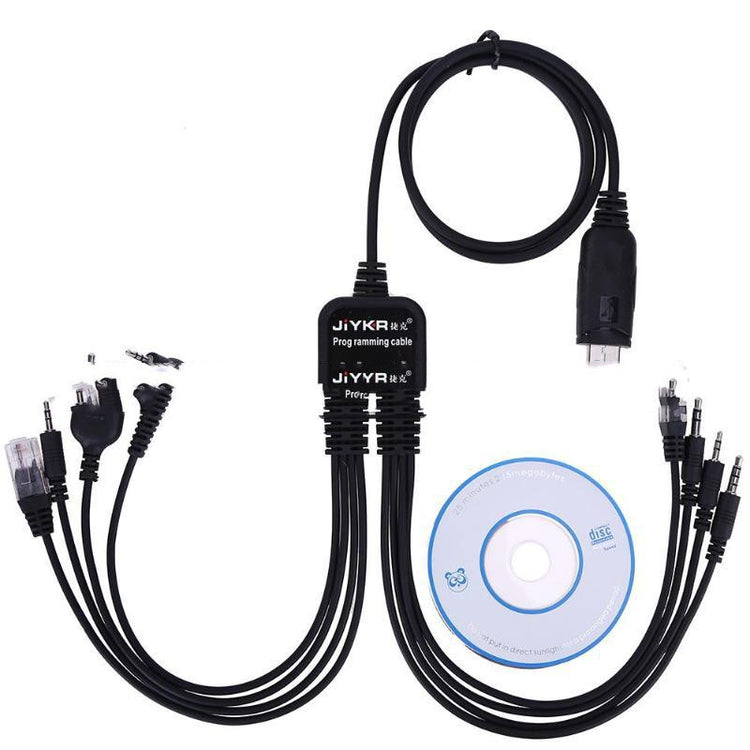 a black cable with a blue disc and a white background