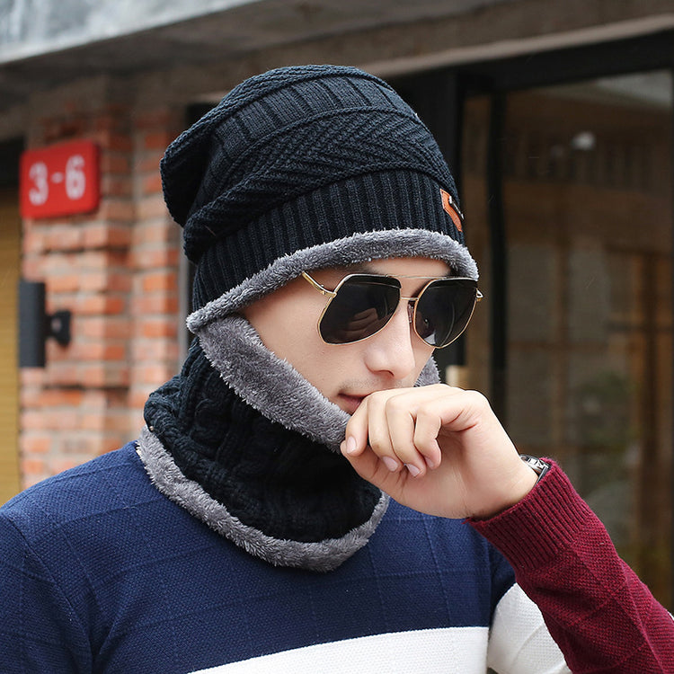 a man wearing sunglasses and a hat