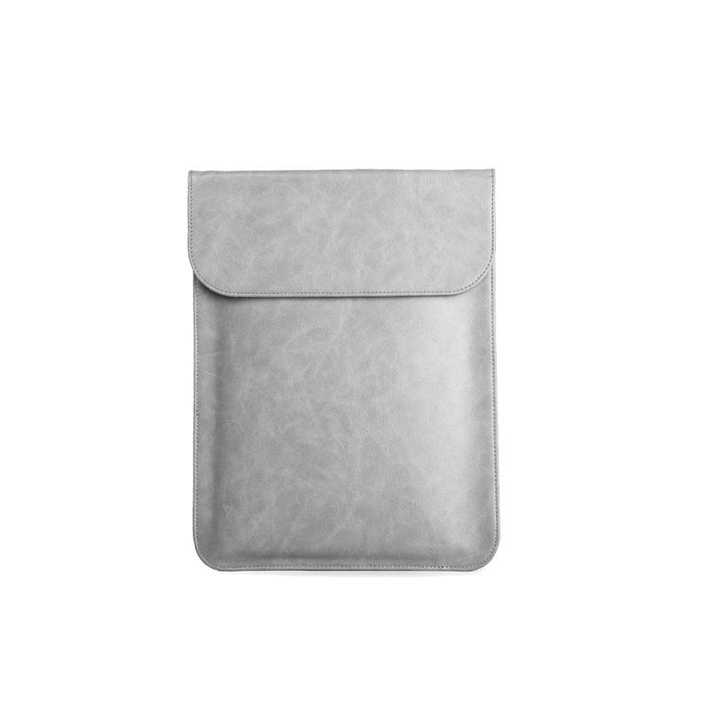 a grey leather case with a pocket
