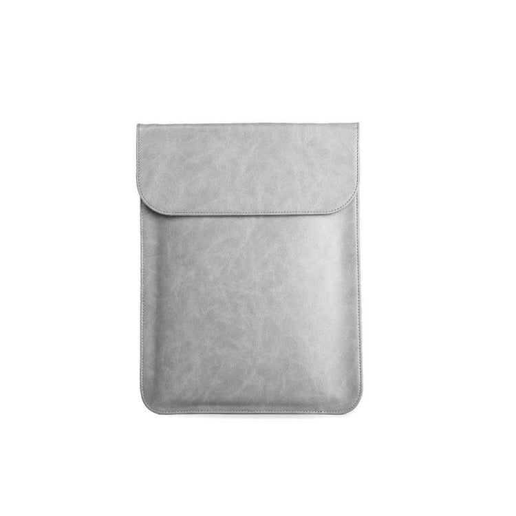 a grey leather case with a pocket