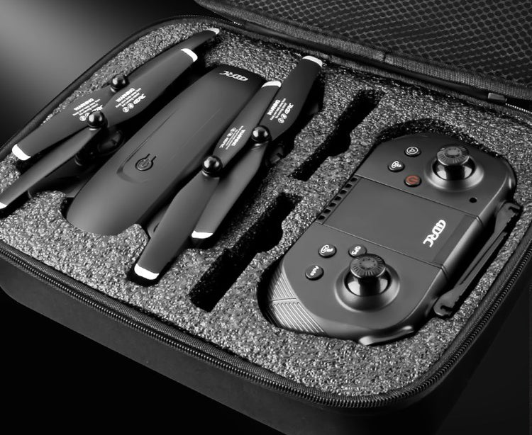 a black case with a drone and remote control