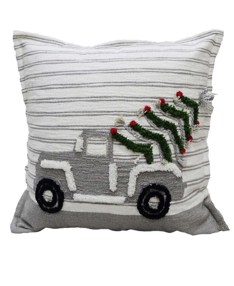 a pillow with a christmas tree on it