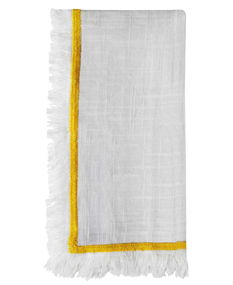a white and yellow fringed cloth