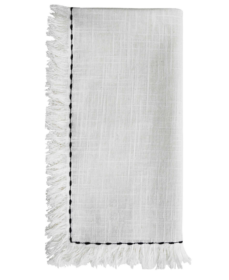 a white cloth with black trim