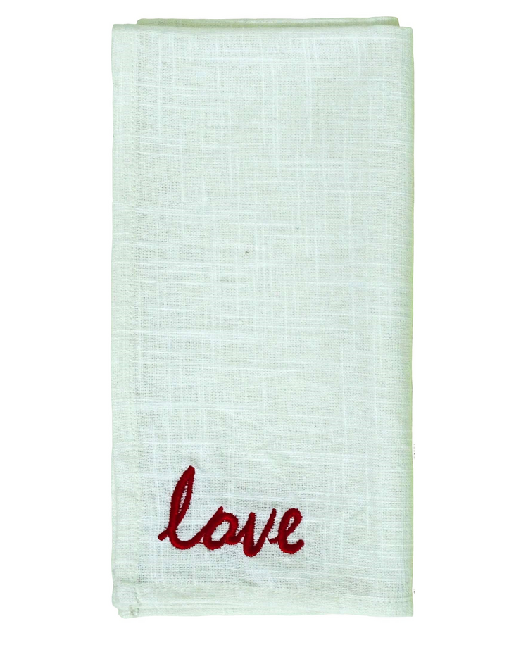 a white cloth with a red word on it