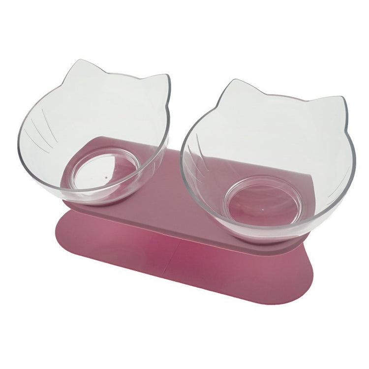 a cat shaped bowls on a pink stand