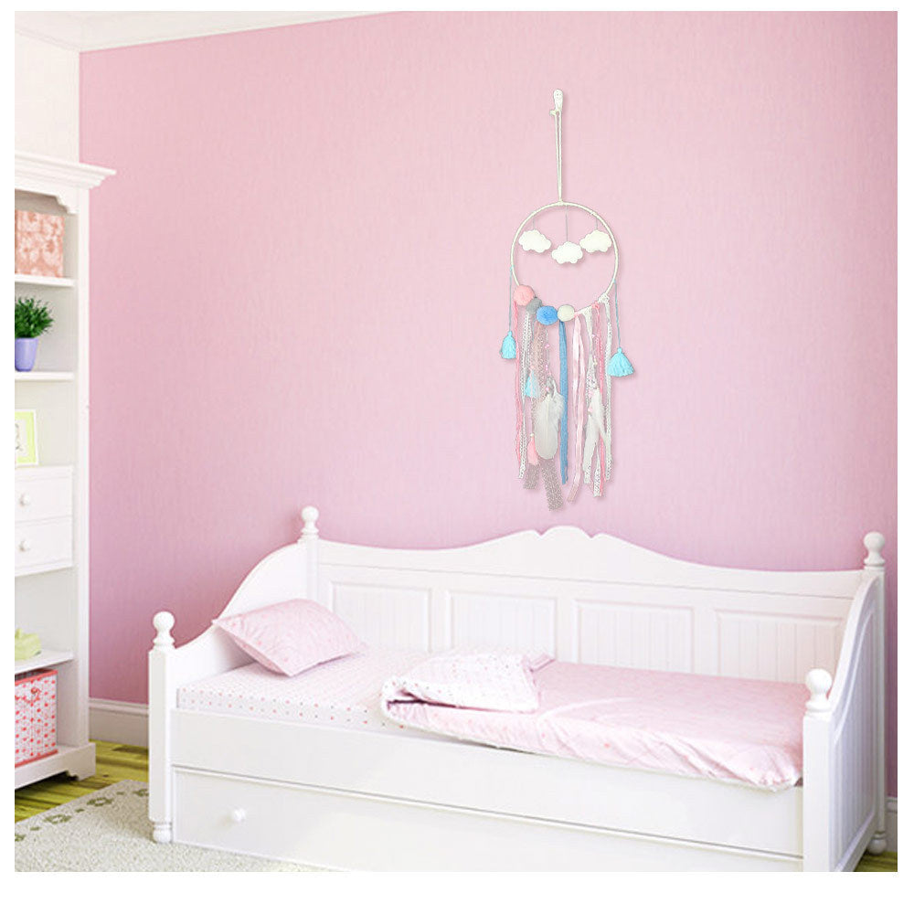 a pink bedroom with a bed and a pink wall