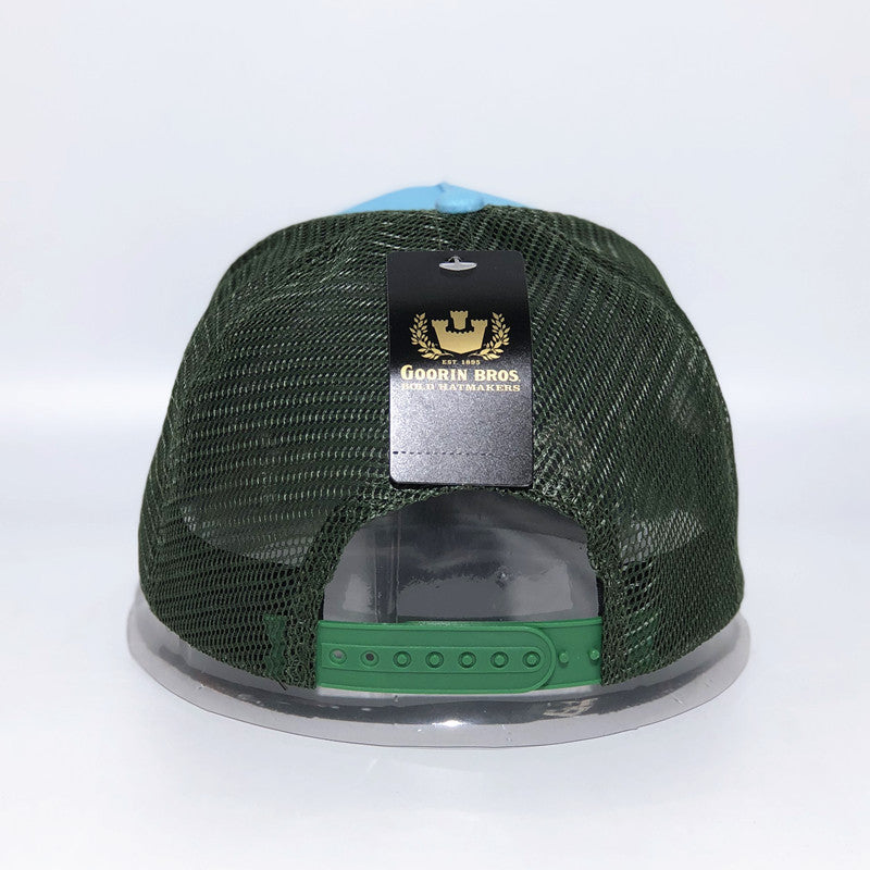 a green and blue hat with a black label