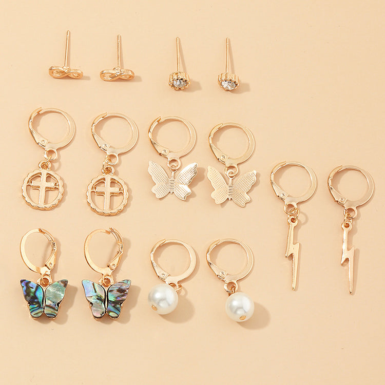 a group of earrings with different designs