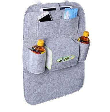 a grey car seat with a pocket and bottles of liquid