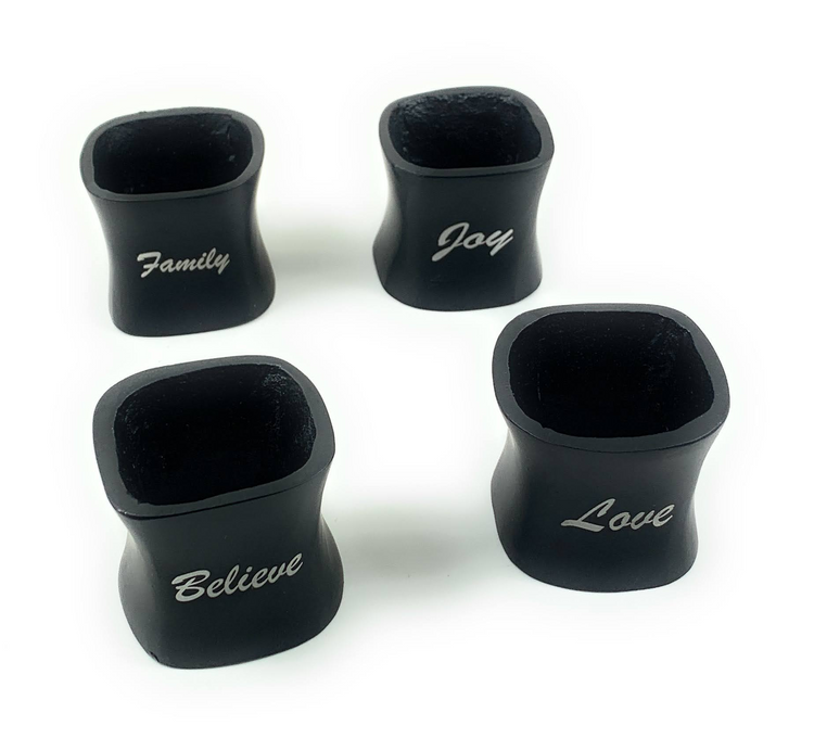 a group of black objects with words