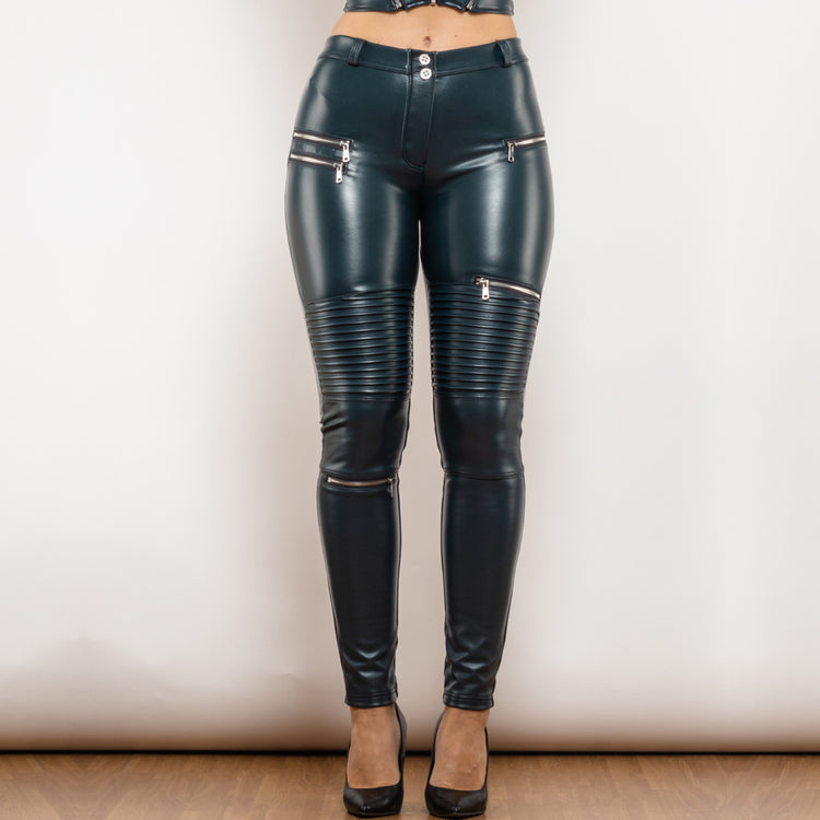 a woman wearing black leather pants