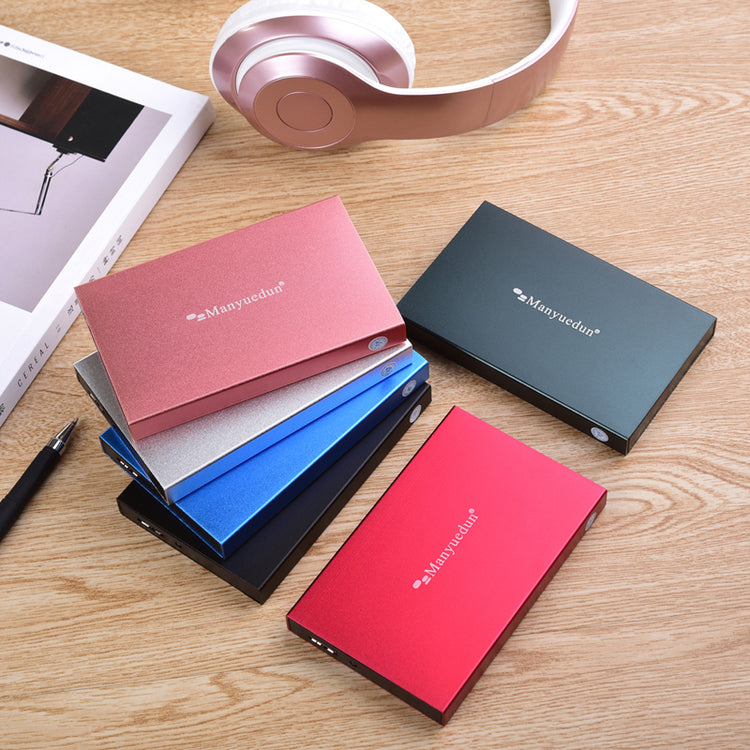 a group of books and headphones on a table