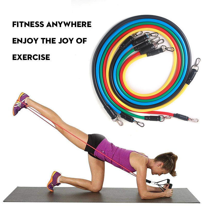 a woman doing exercise with a resistance band