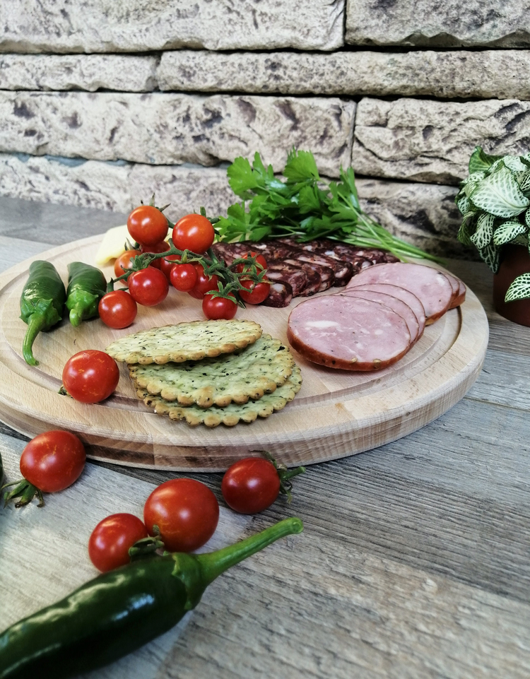 a plate of food on a wood surface