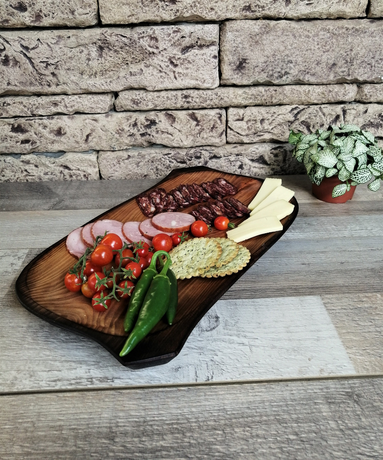 a platter of food on a wood surface