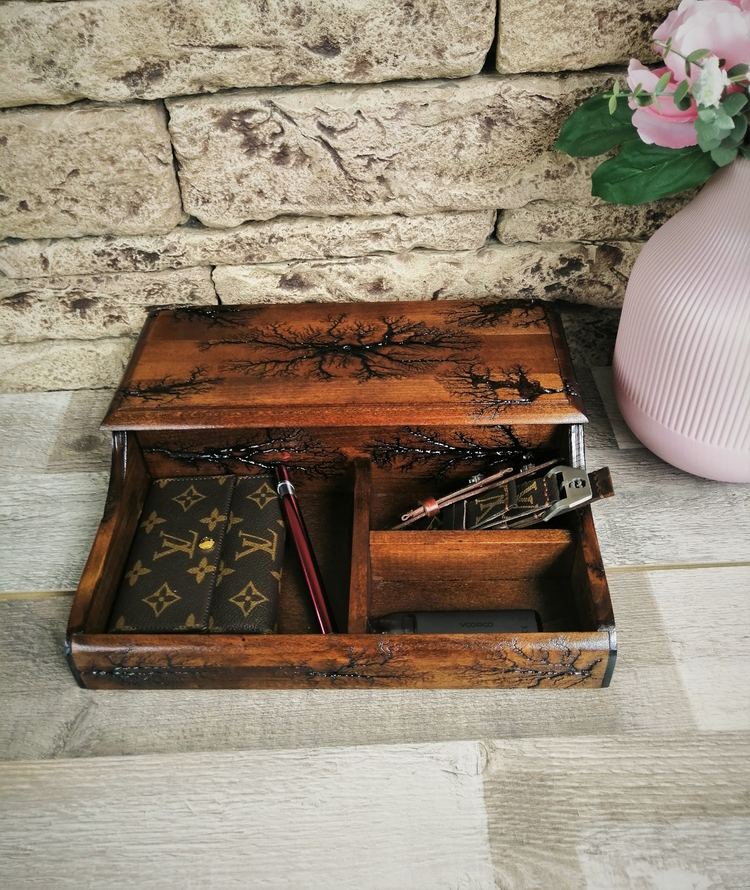 a wooden box with a pen and a box with a box inside