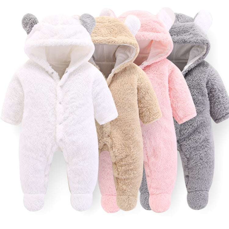 a group of baby clothes