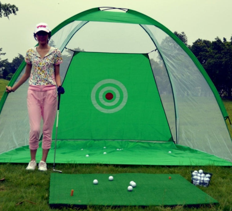 a woman standing next to a golf course